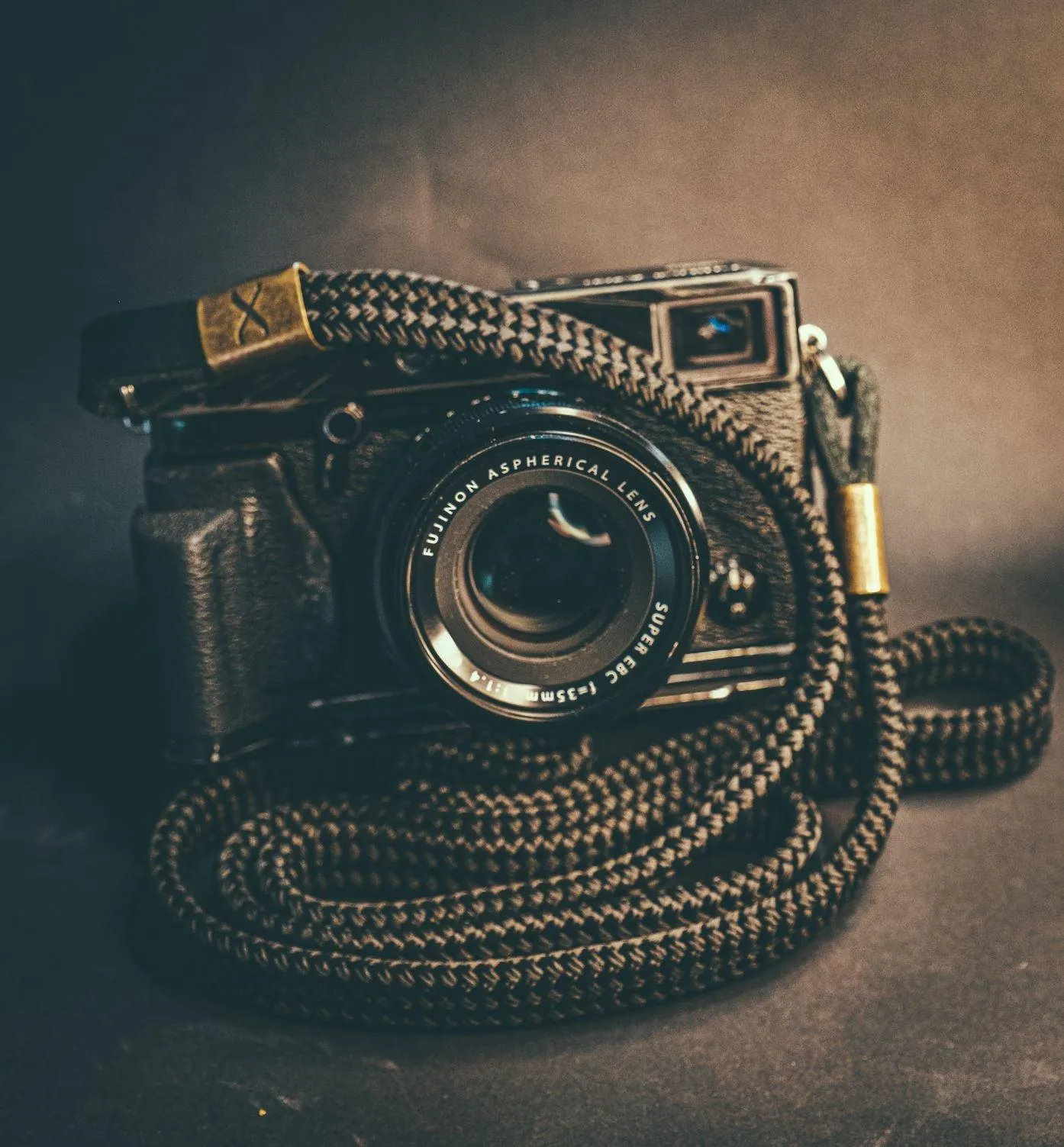 X  Black Flat Rope -Black Leather Camera Strap - Bronze X