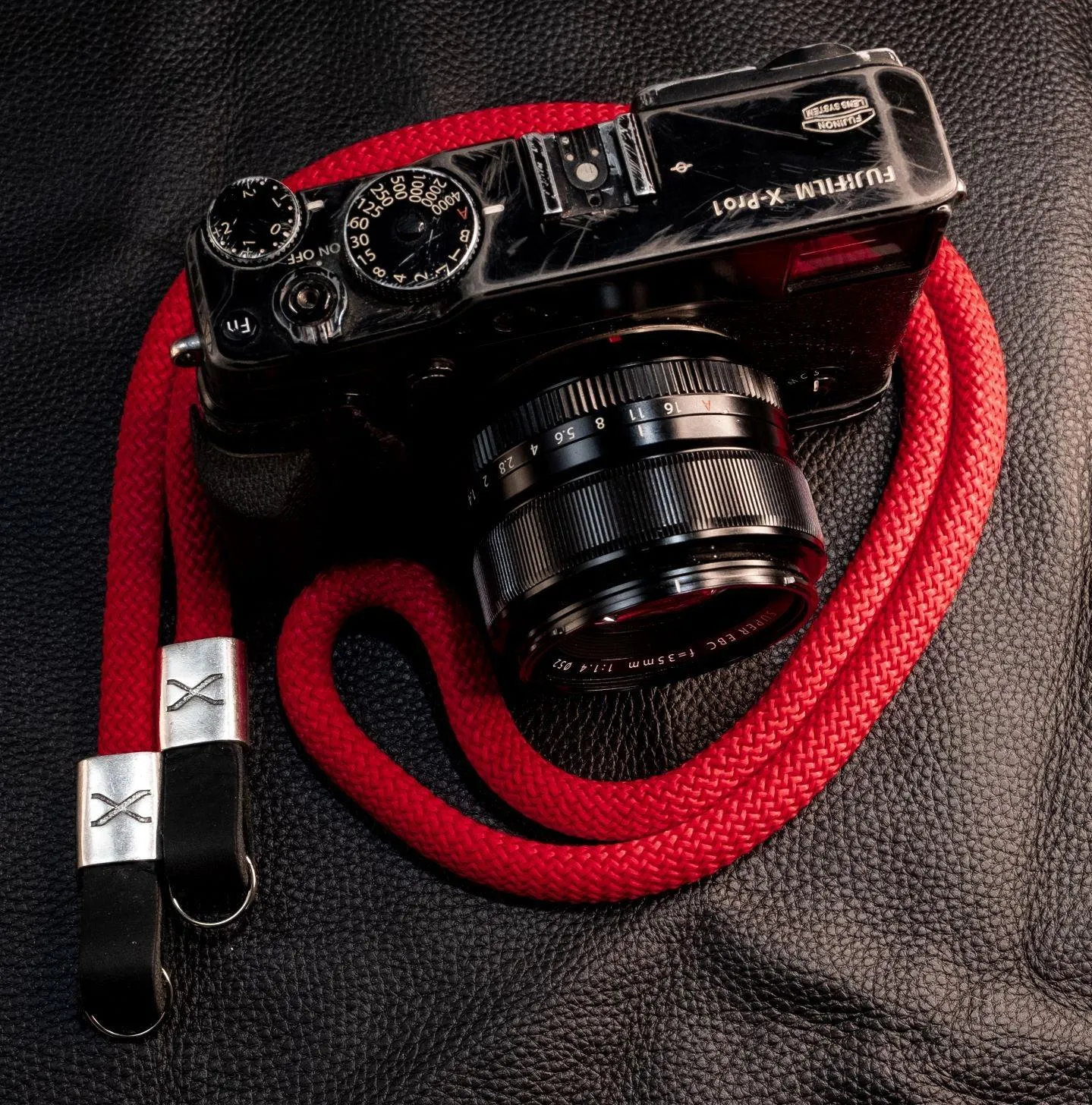 X  Red Rope - Black Leather Camera Strap - Silver X